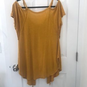 Picture doesn’t do this shirt justice. Flowey, loose fitting tank with open back